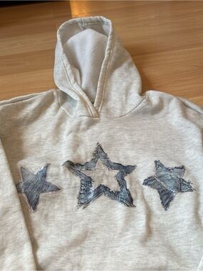 SHEIN Cream Hoodie with Distressed Blue Star Patches
